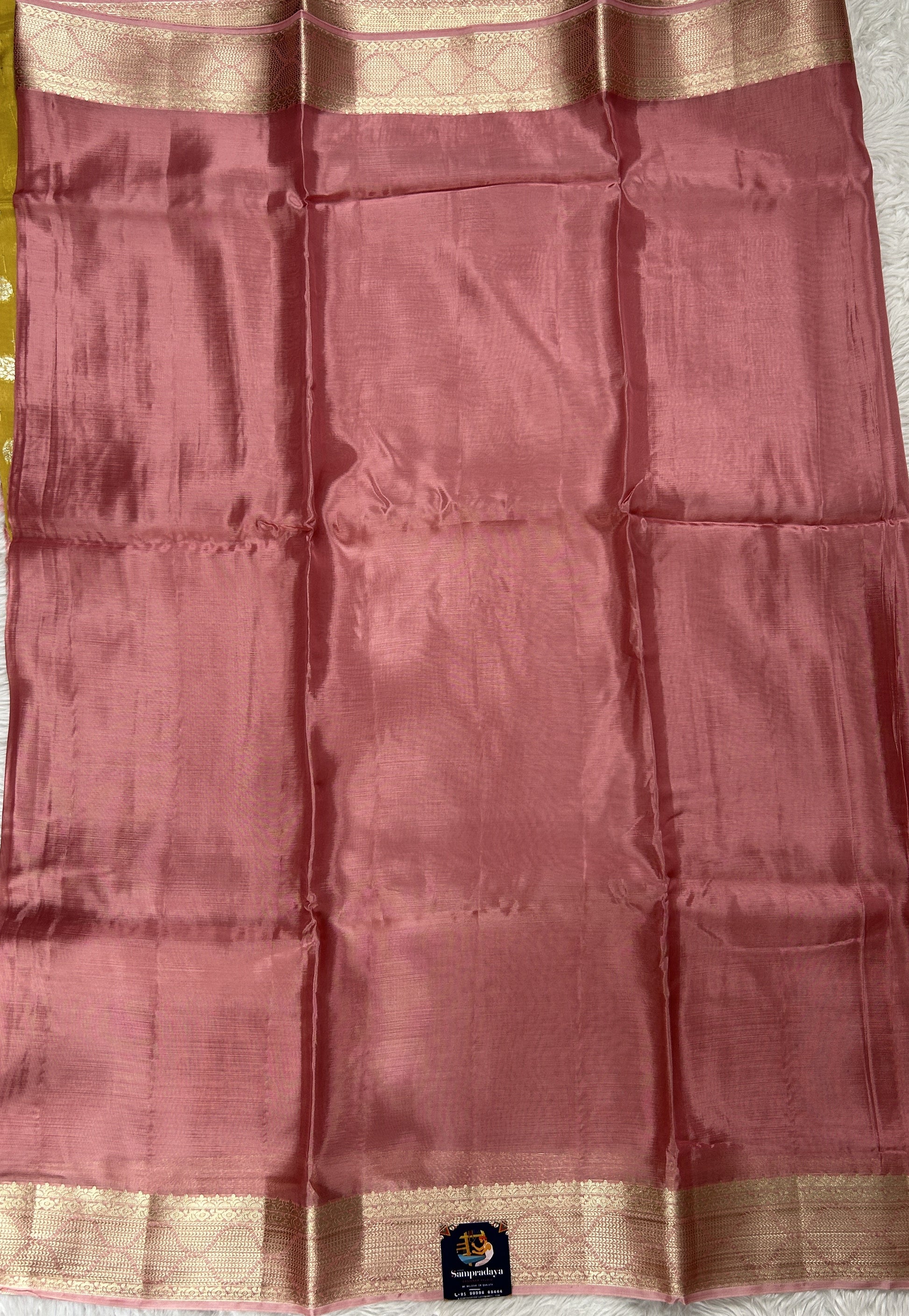 Satin Georgette Saree Soft Pink Colored Complemented with a Zari Border. - Sampradaya Designer Studio