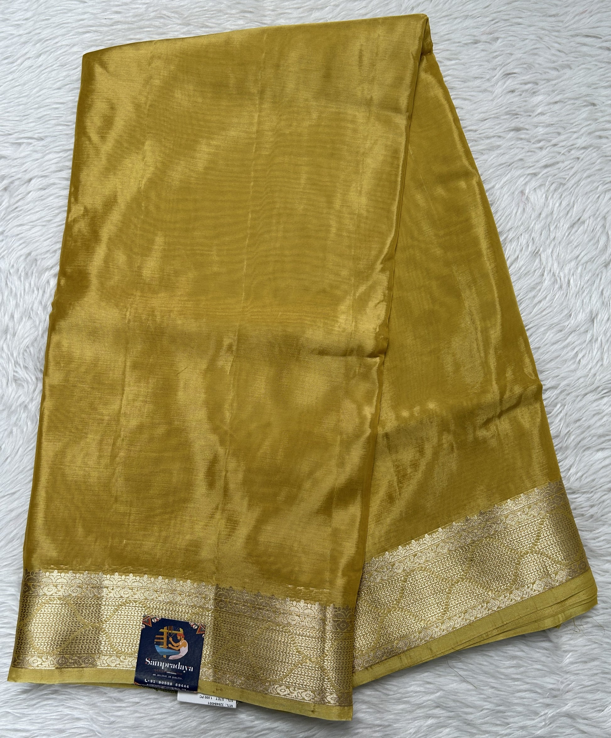 Satin Georgette Saree Yellow Colored Complemented with a Zari Border. - Sampradaya Designer Studio