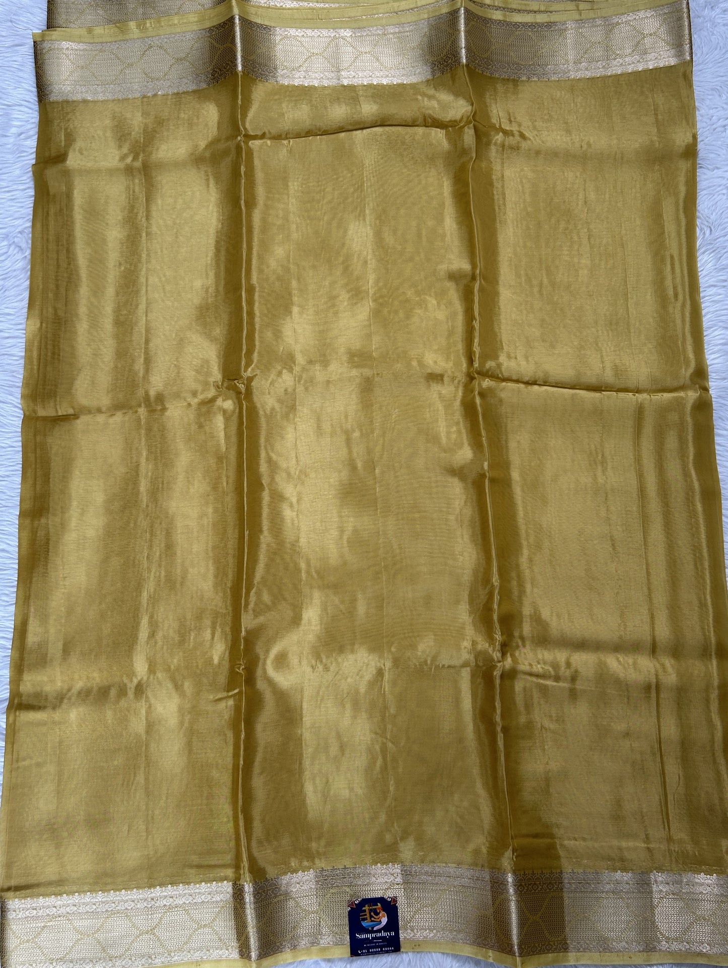 Satin Georgette Saree Yellow Colored Complemented with a Zari Border. - Sampradaya Designer Studio