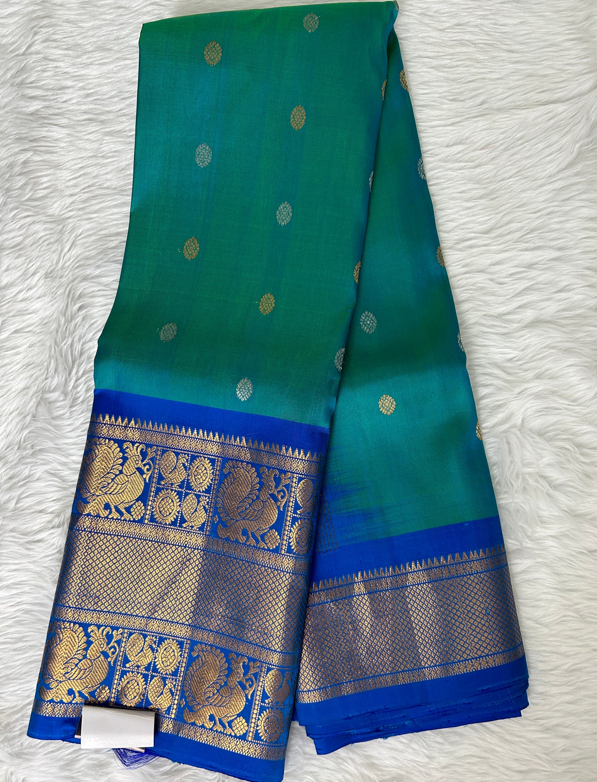 Gadwal Pattu Saree Peacock Blue Colored Complemented With a Pattu Royal Blue Border - Sampradaya Designer Studio