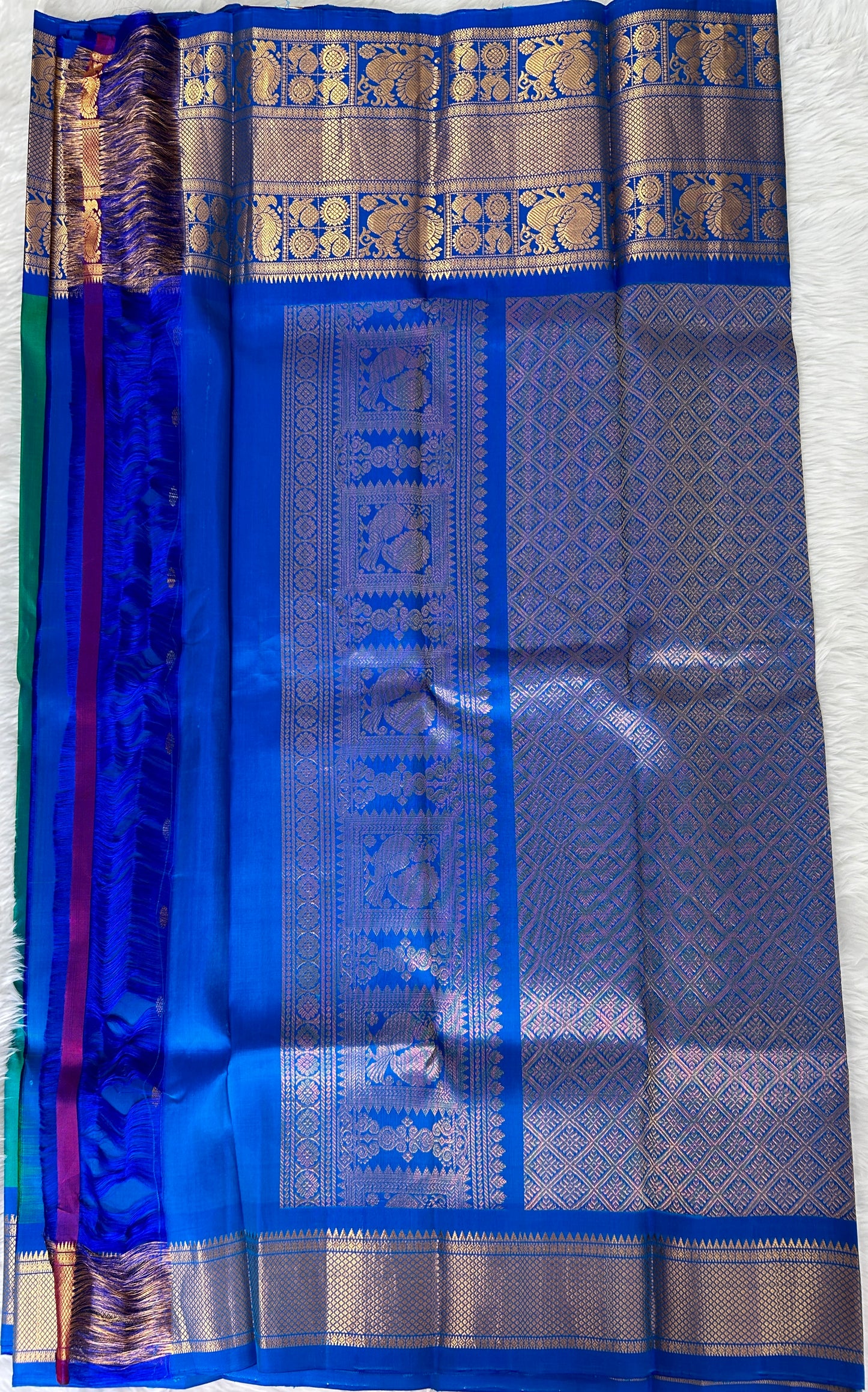 Gadwal Pattu Saree Peacock Blue Colored Complemented With a Pattu Royal Blue Border - Sampradaya Designer Studio
