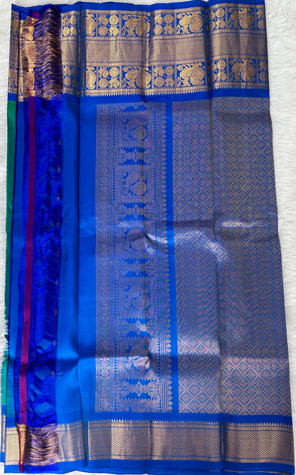 Gadwal Pattu Saree Peacock Blue Colored Complemented With a Pattu Royal Blue Border - Sampradaya Designer Studio