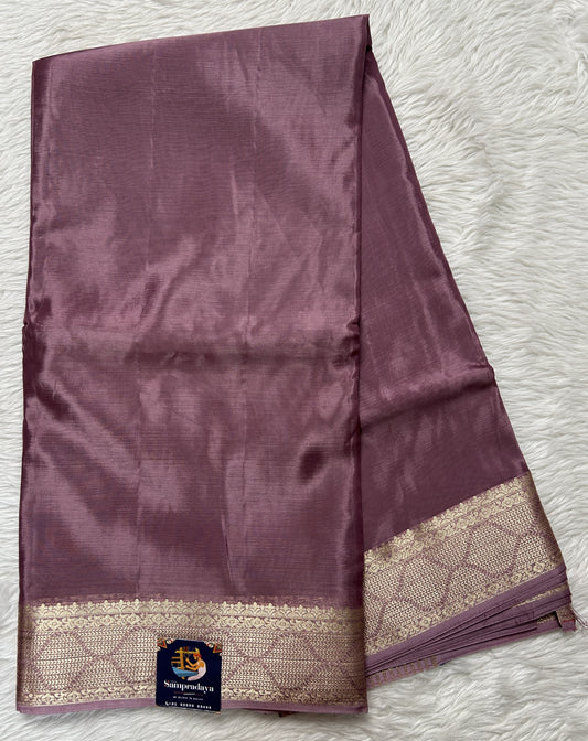 Satin Georgette Saree Mauve Colored Complemented with a Zari Border. - Sampradaya Designer Studio