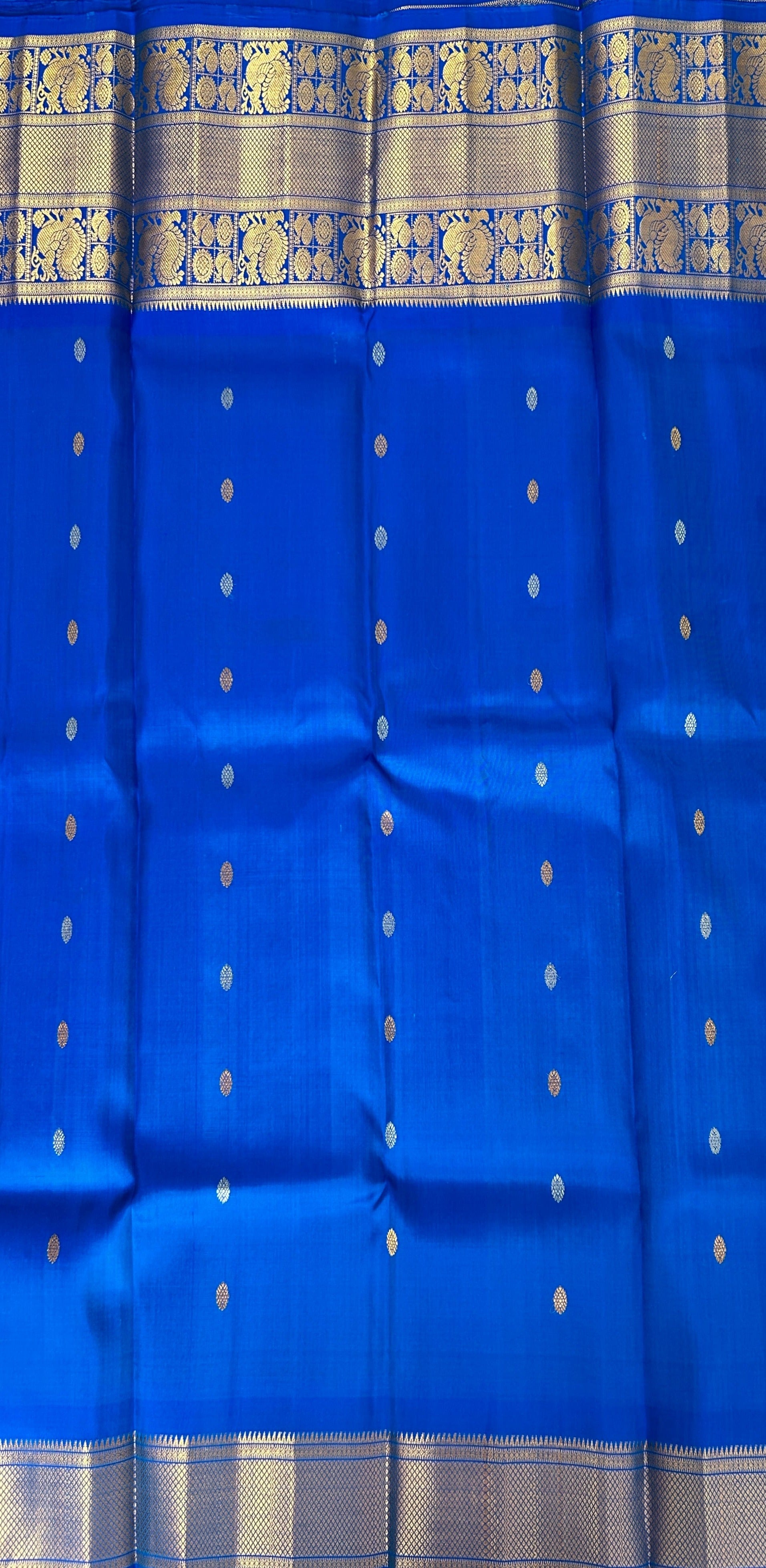 Gadwal Pattu Saree Peacock Blue Colored Complemented With a Pattu Royal Blue Border - Sampradaya Designer Studio