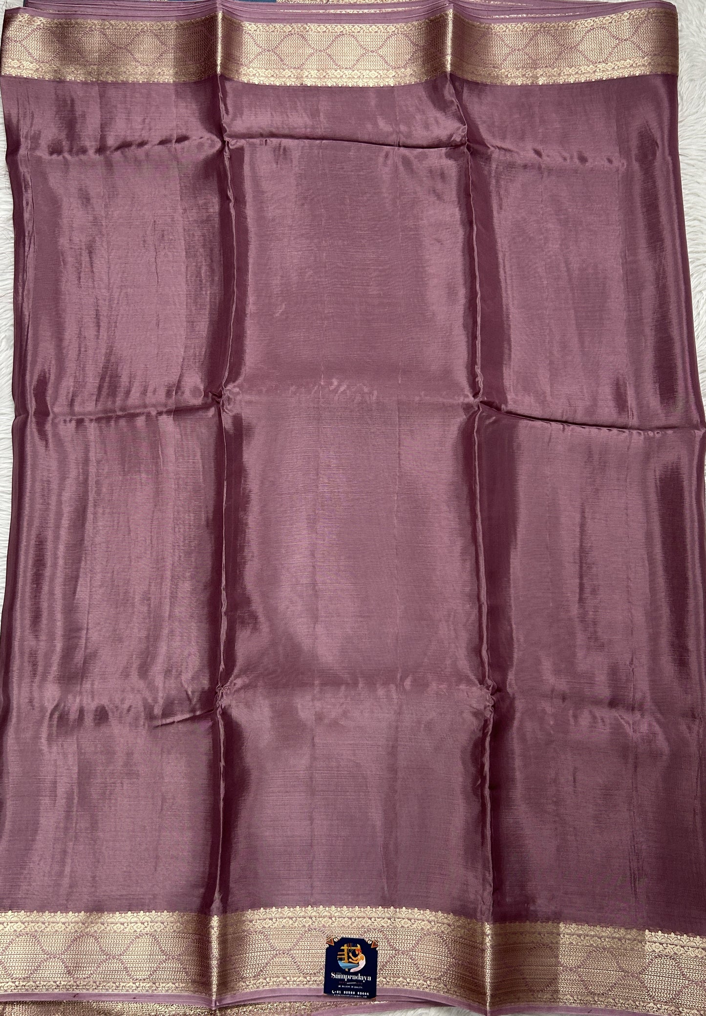 Satin Georgette Saree Mauve Colored Complemented with a Zari Border. - Sampradaya Designer Studio