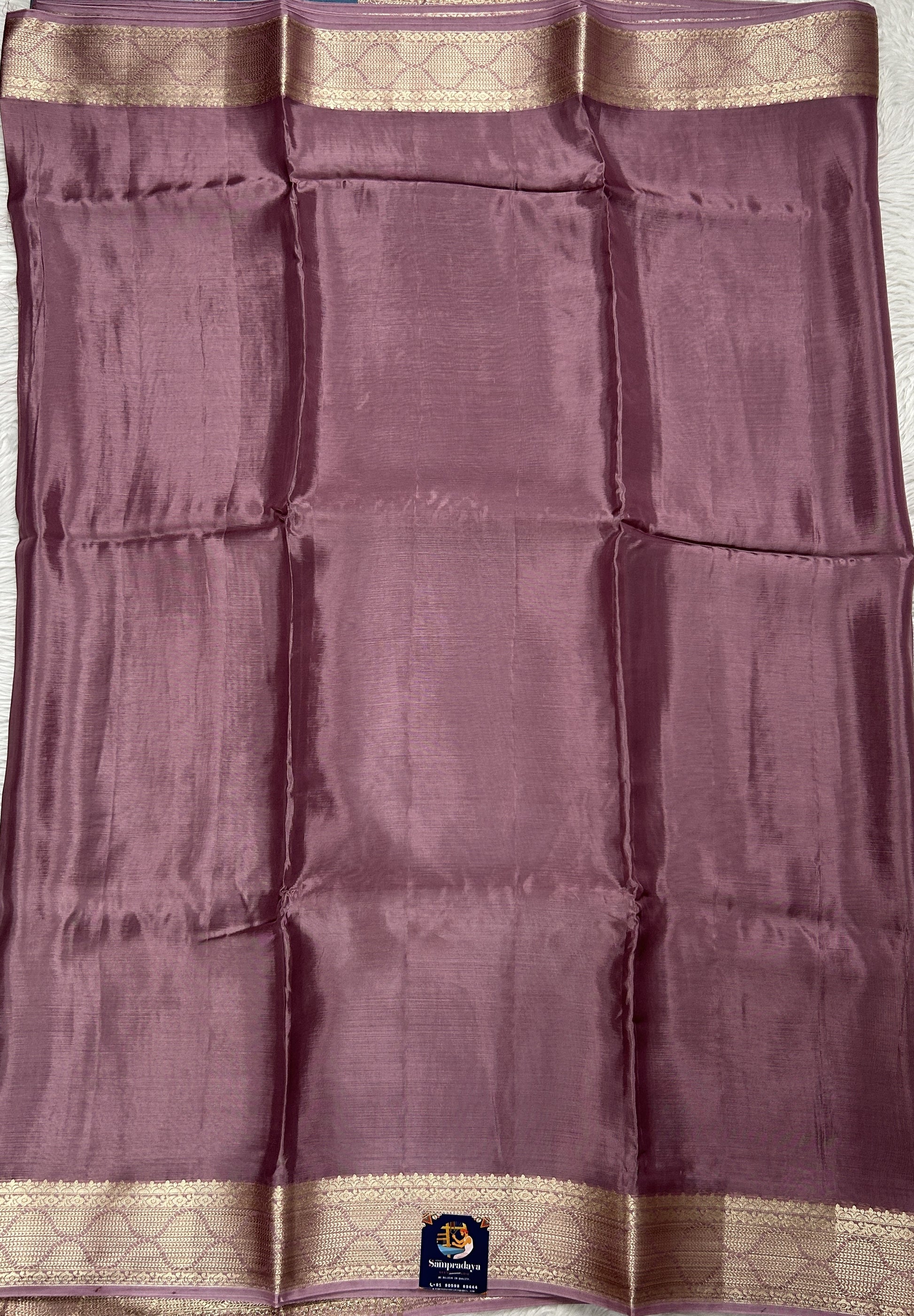 Satin Georgette Saree Mauve Colored Complemented with a Zari Border. - Sampradaya Designer Studio