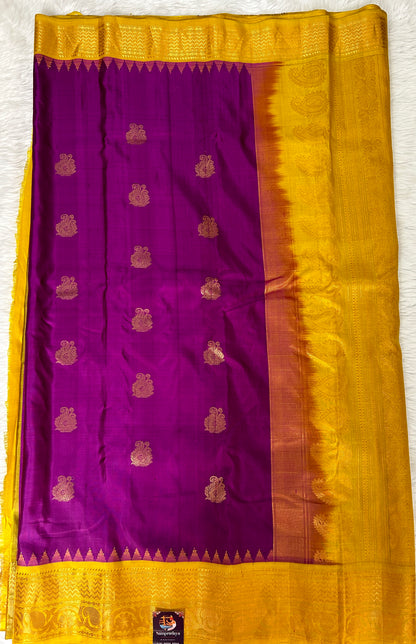 Gadwal Pattu Saree Purple Colored Complemented With a Pattu Mustard Yellow Border - Sampradaya Designer Studio