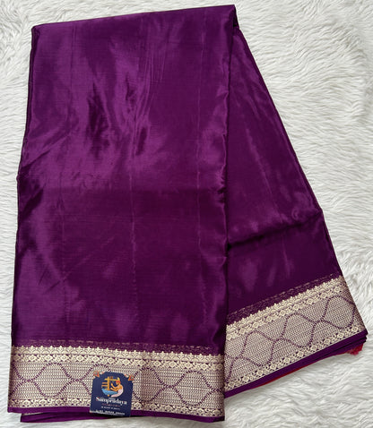 Satin Georgette Saree Purple Colored Complemented with a Zari Border. - Sampradaya Designer Studio