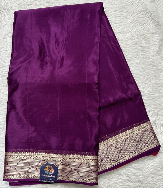 Satin Georgette Saree Purple Colored Complemented with a Zari Border. - Sampradaya Designer Studio