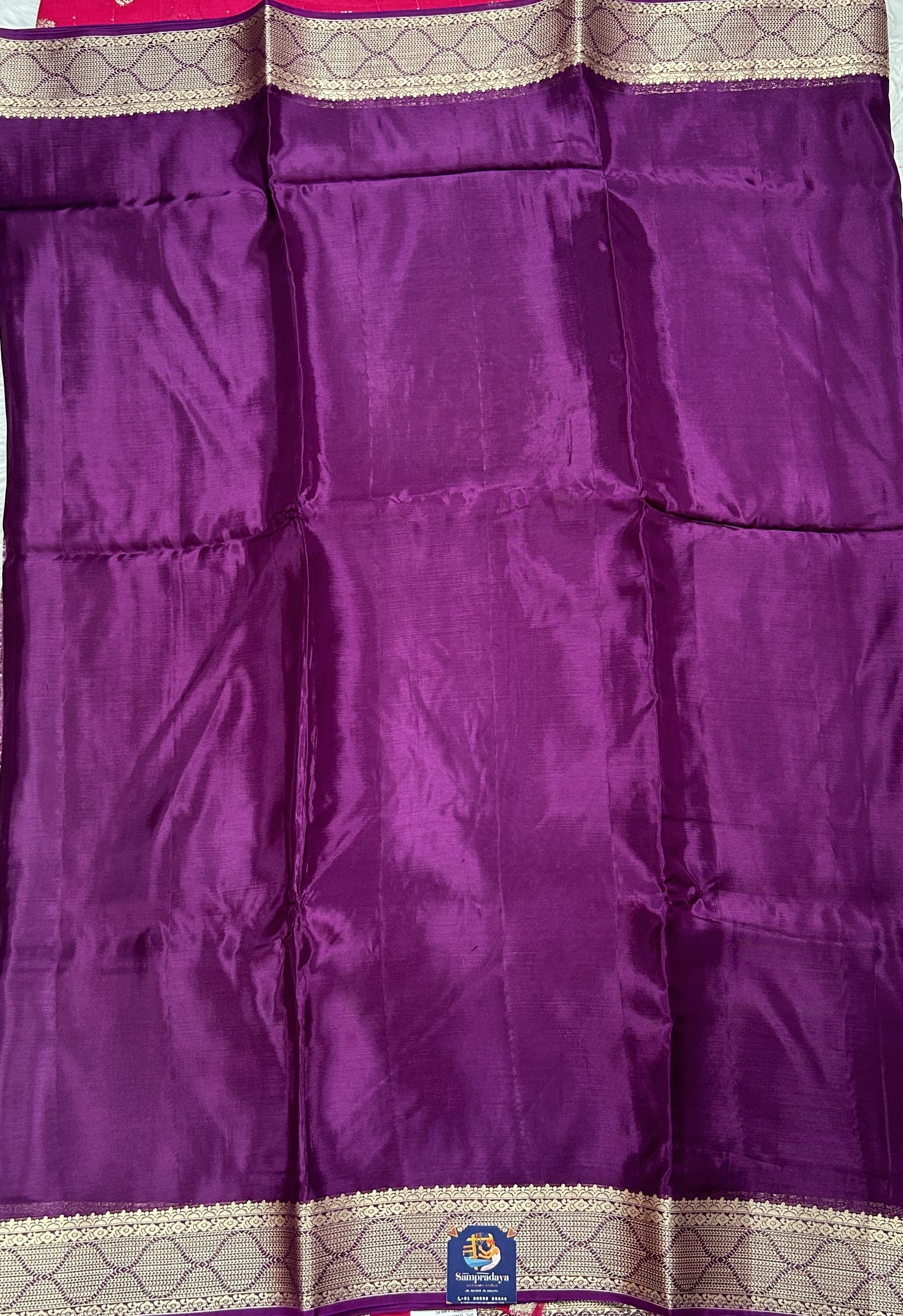Satin Georgette Saree Purple Colored Complemented with a Zari Border. - Sampradaya Designer Studio