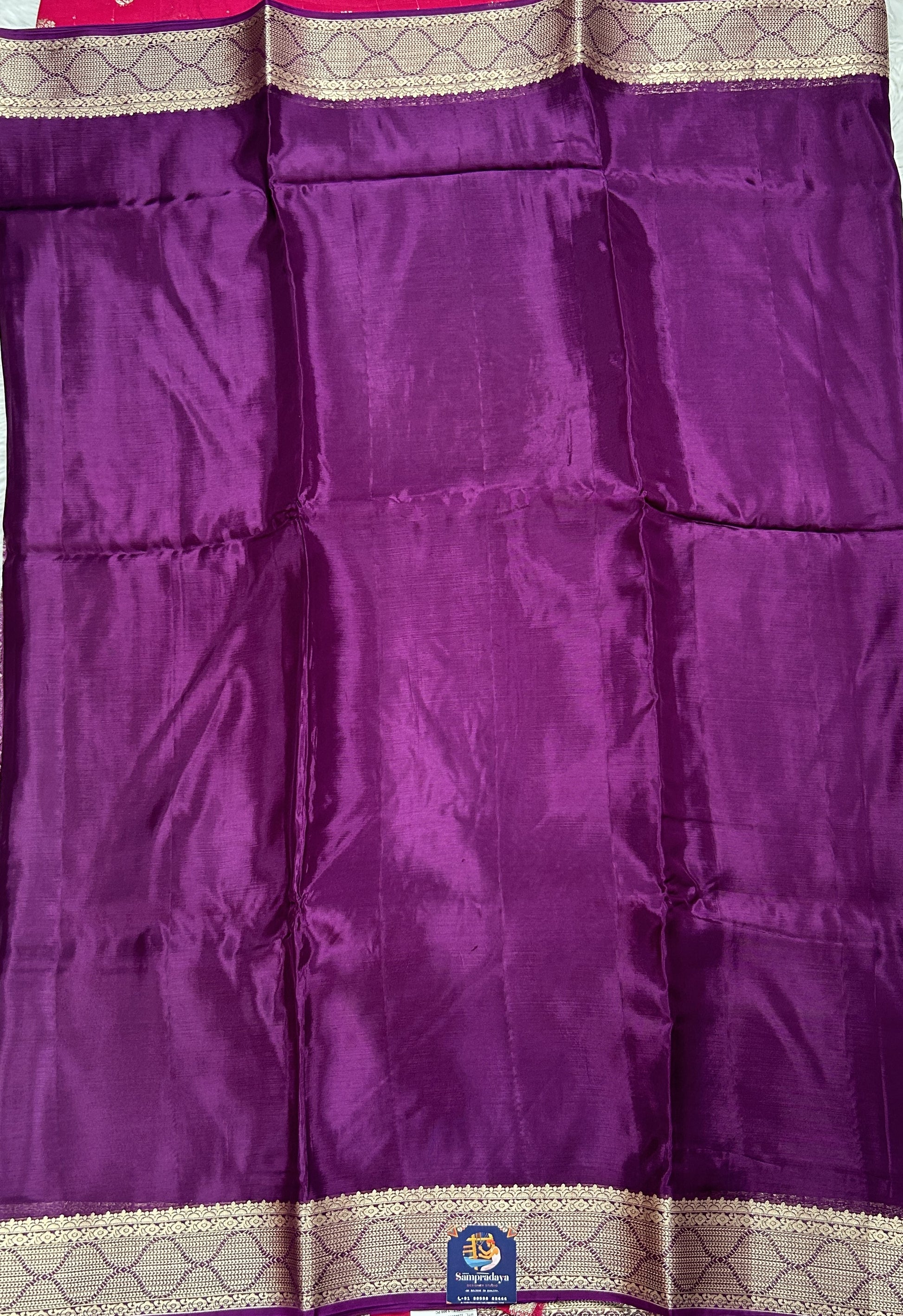 Satin Georgette Saree Purple Colored Complemented with a Zari Border. - Sampradaya Designer Studio