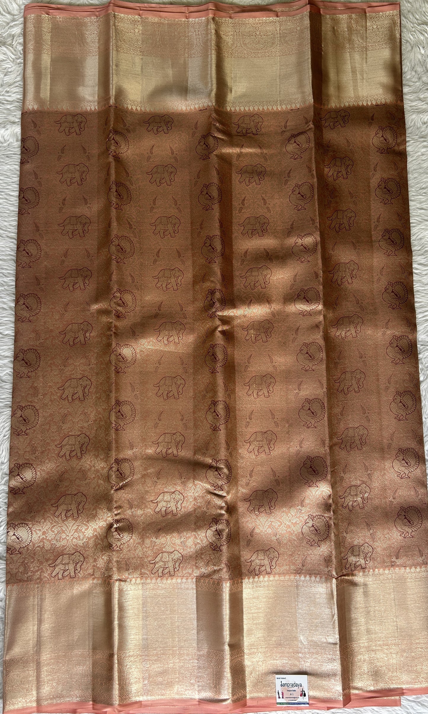 Kanjivaram Bridal Silk Saree Pale Orange colored Saree complemented with a Zari border. - Sampradaya Designer Studio