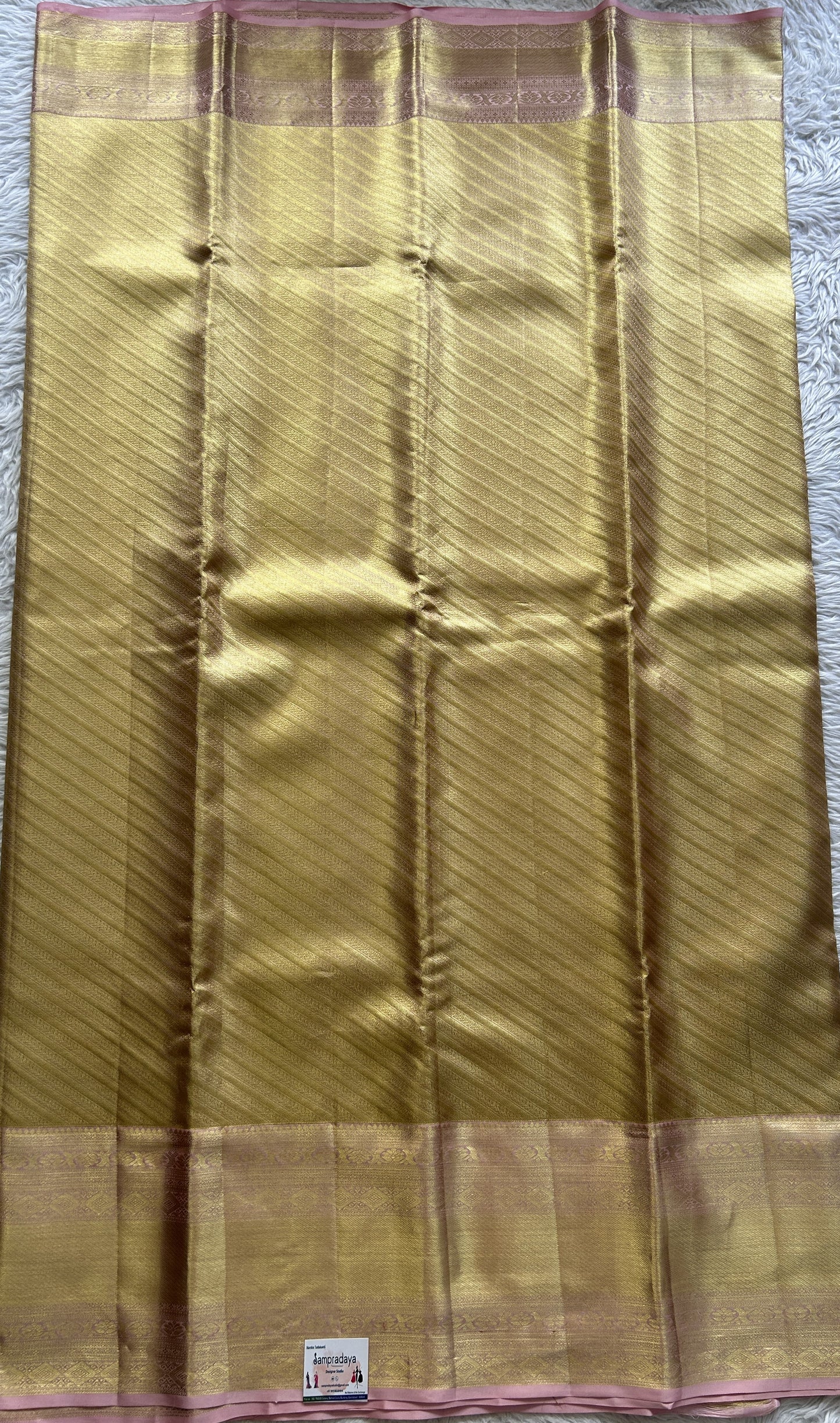 Kanjivaram Bridal Silk Saree Gold colored Saree complemented with a Zari border. - Sampradaya Designer Studio