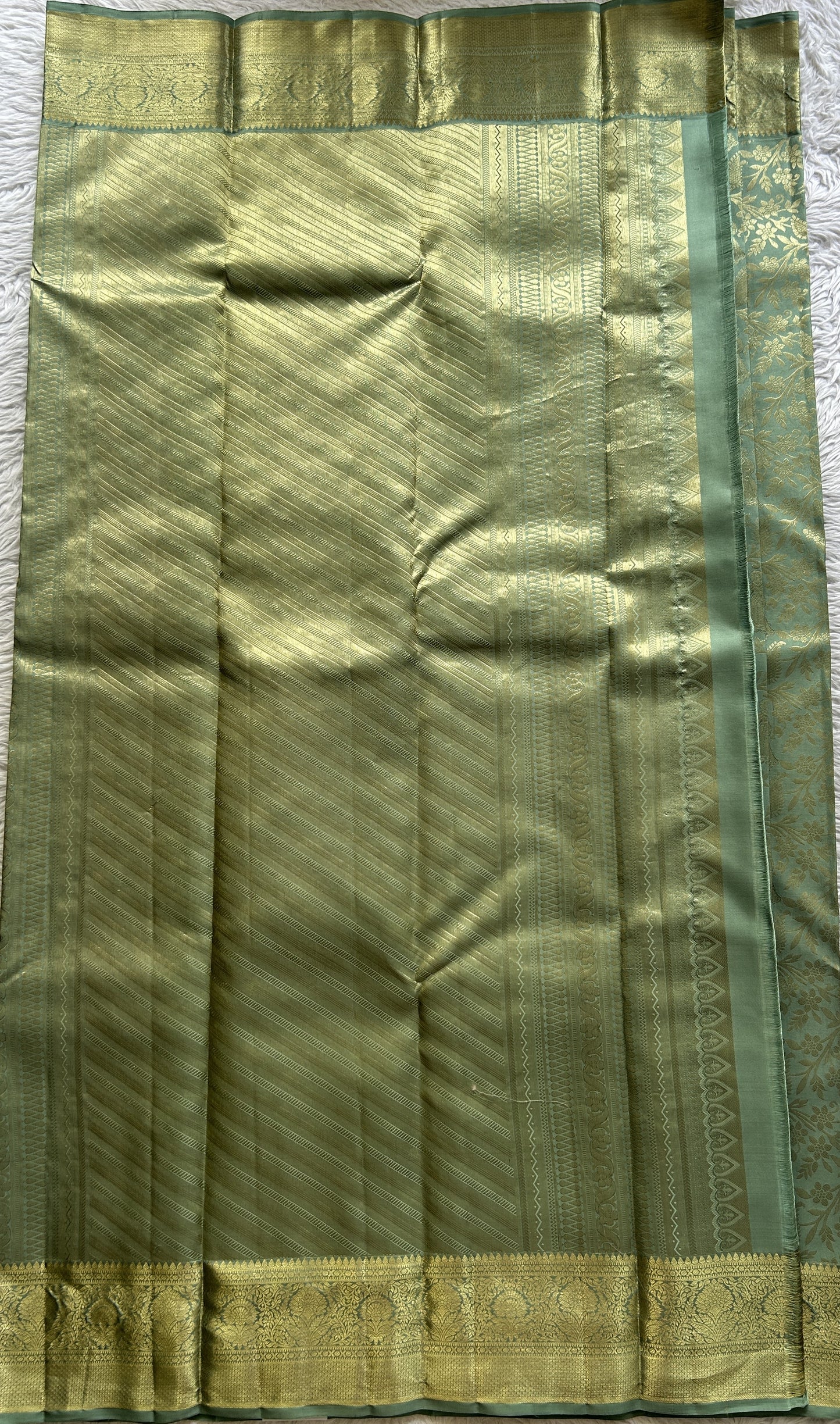 Kanjivaram Bridal Silk Saree Sea Green colored Saree complemented with a Zari border. - Sampradaya Designer Studio