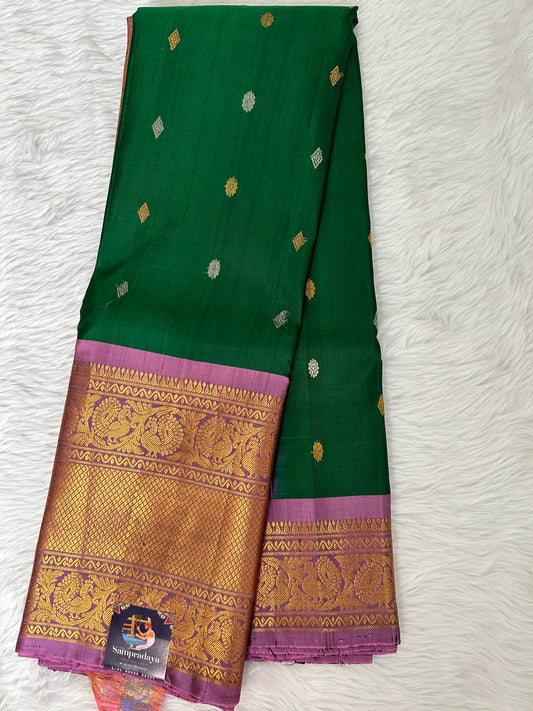 Gadwal Pattu Saree Leaf Green Colored Complemented With a Pattu Onion Pink Color Border - Sampradaya Designer Studio