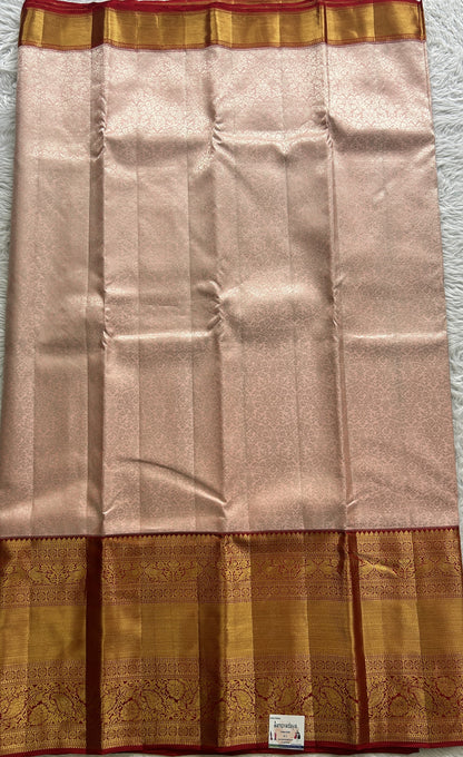 Kanjivaram Bridal Silk Saree Light Peach colored complemented with a Zari border. - Sampradaya Designer Studio