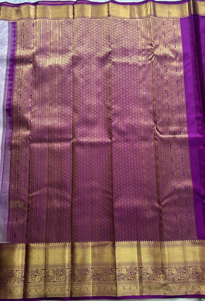 Kanjivaram Bridal Silk Saree Light Lilac colored complemented with a Zari border. - Sampradaya Designer Studio