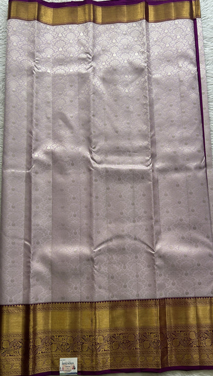Kanjivaram Bridal Silk Saree Light Lilac colored complemented with a Zari border. - Sampradaya Designer Studio