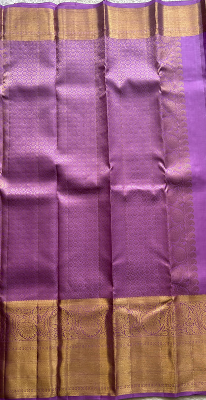 Kanjivaram Bridal Silk Saree Plum colored complemented with a Zari border. - Sampradaya Designer Studio