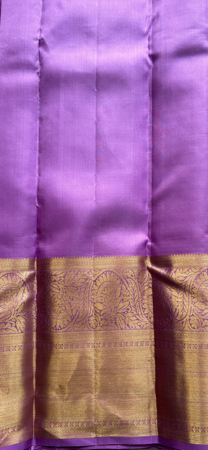 Kanjivaram Bridal Silk Saree Plum colored complemented with a Zari border. - Sampradaya Designer Studio