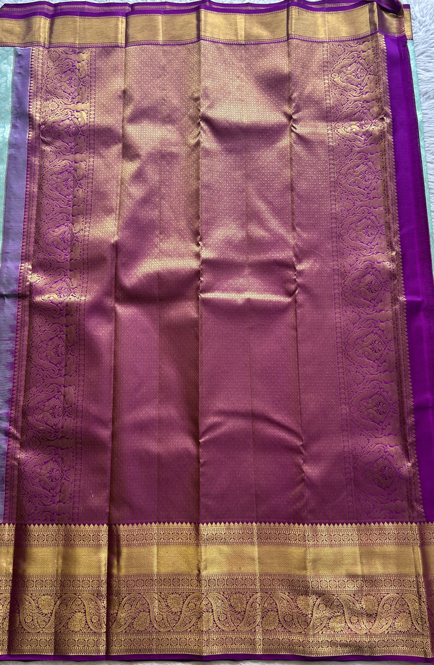 Kanjivaram Bridal Silk Saree Aqua Blue colored complemented with a Zari border. - Sampradaya Designer Studio
