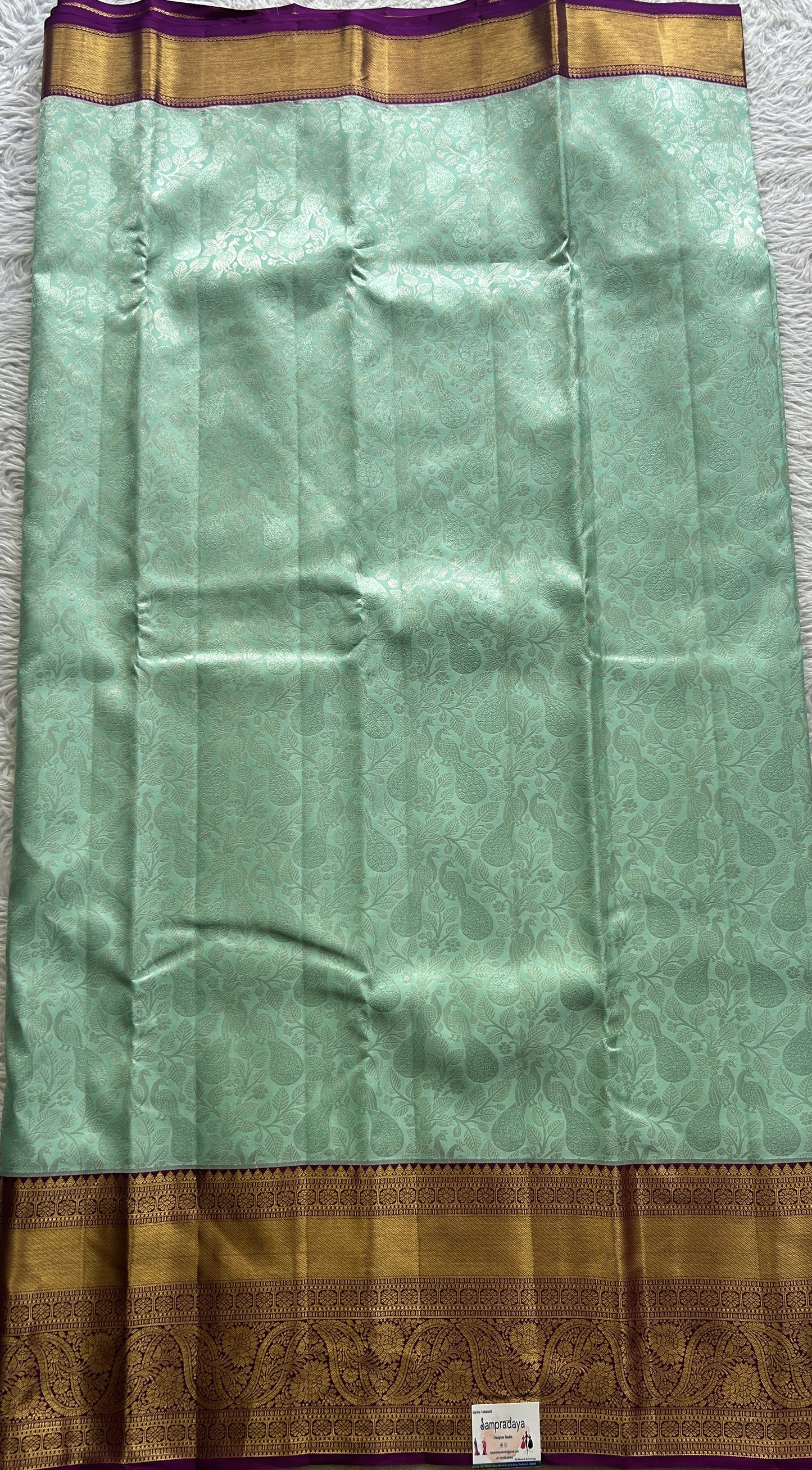 Kanjivaram Bridal Silk Saree Aqua Blue colored complemented with a Zari border. - Sampradaya Designer Studio