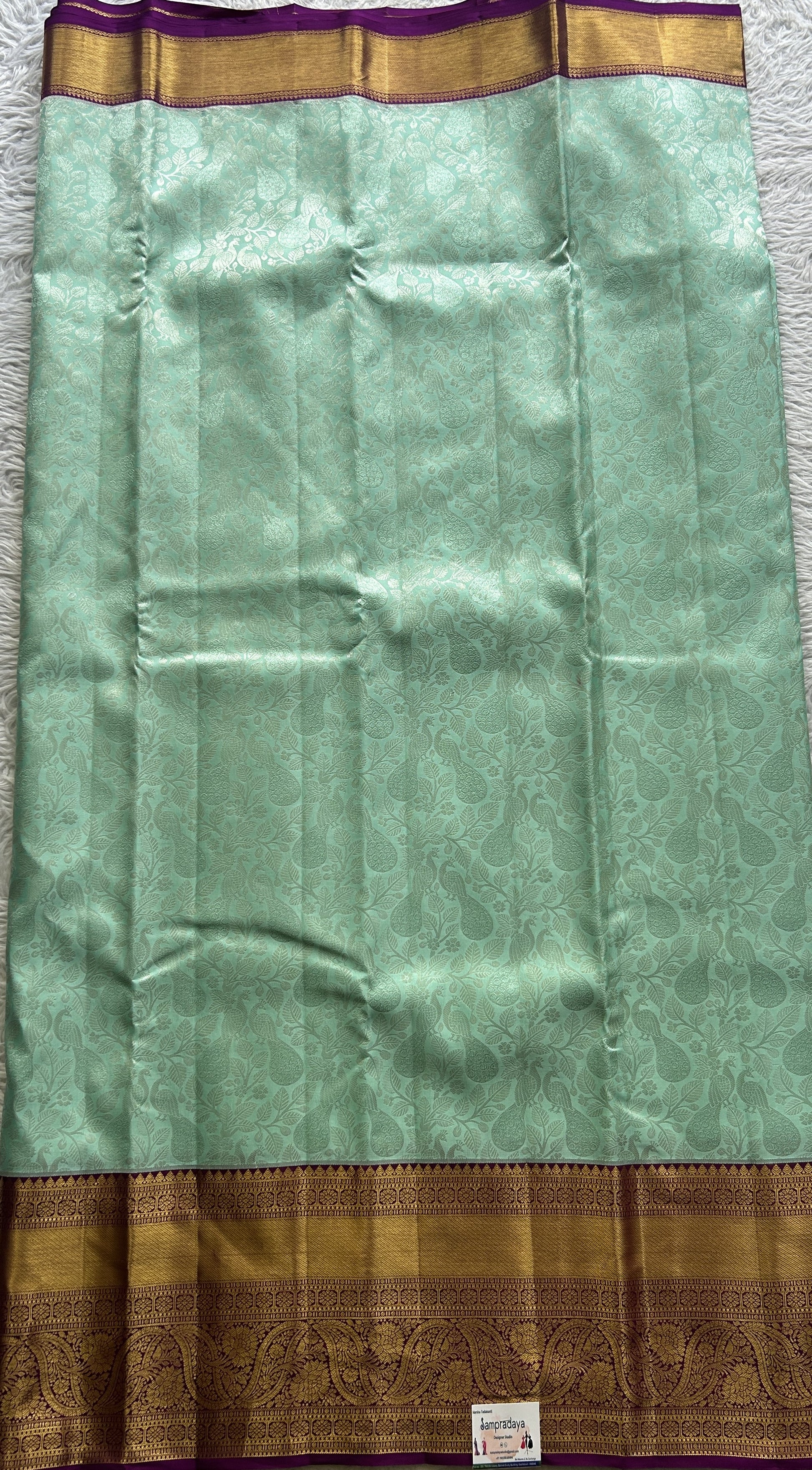 Kanjivaram Bridal Silk Saree Aqua Blue colored complemented with a Zari border. - Sampradaya Designer Studio
