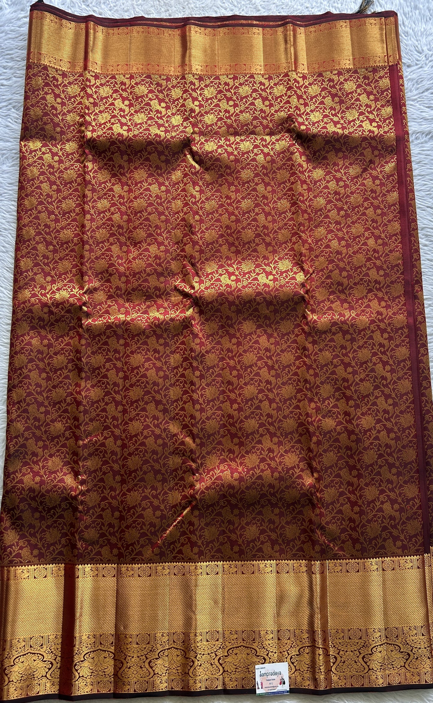 Kanjivaram Bridal Silk Saree Dark Maroon colored complemented with a Zari border. - Sampradaya Designer Studio