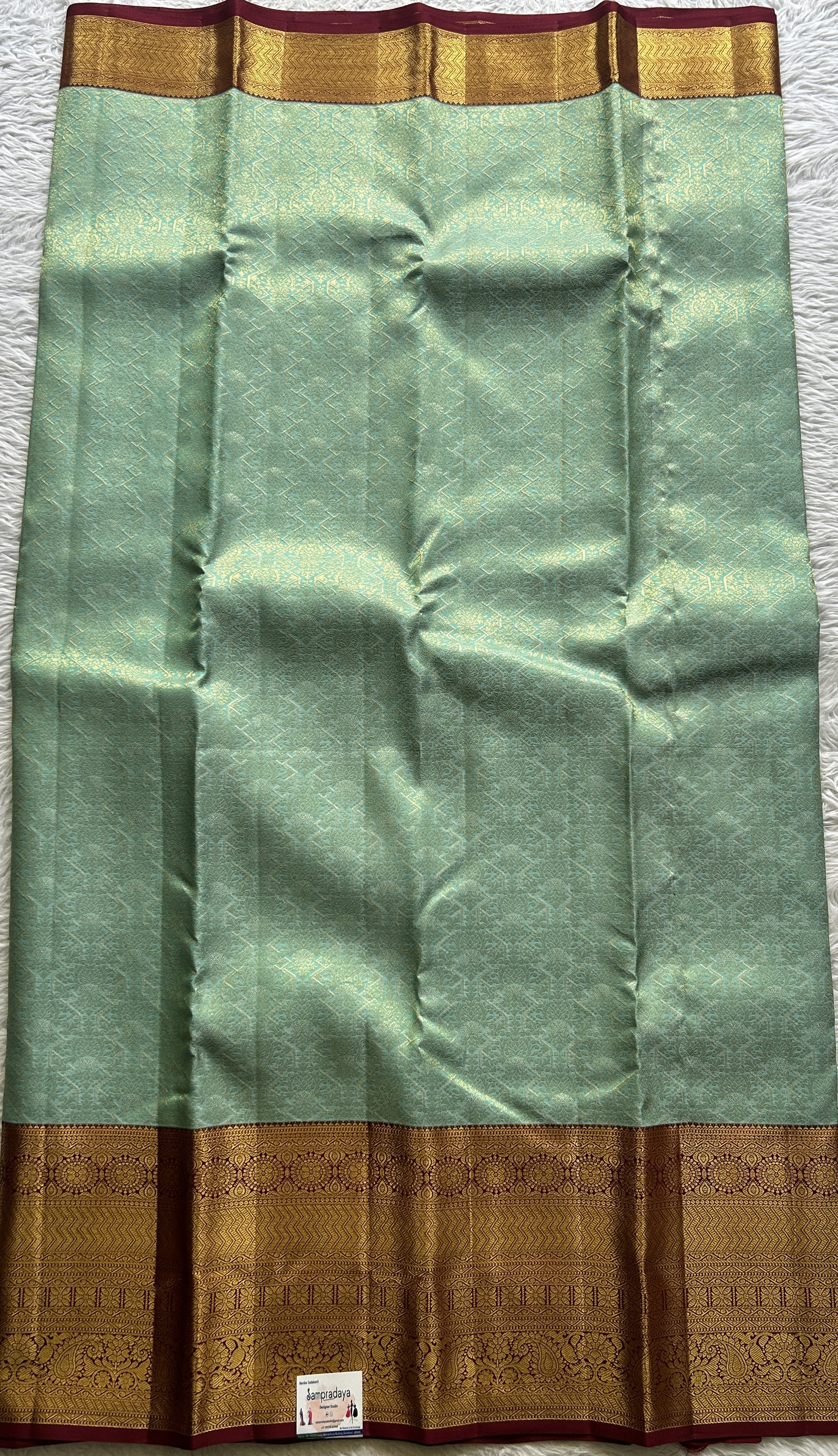 Kanjivaram Bridal Silk Saree Light Sea Blue colored complemented with a Zari border. - Sampradaya Designer Studio