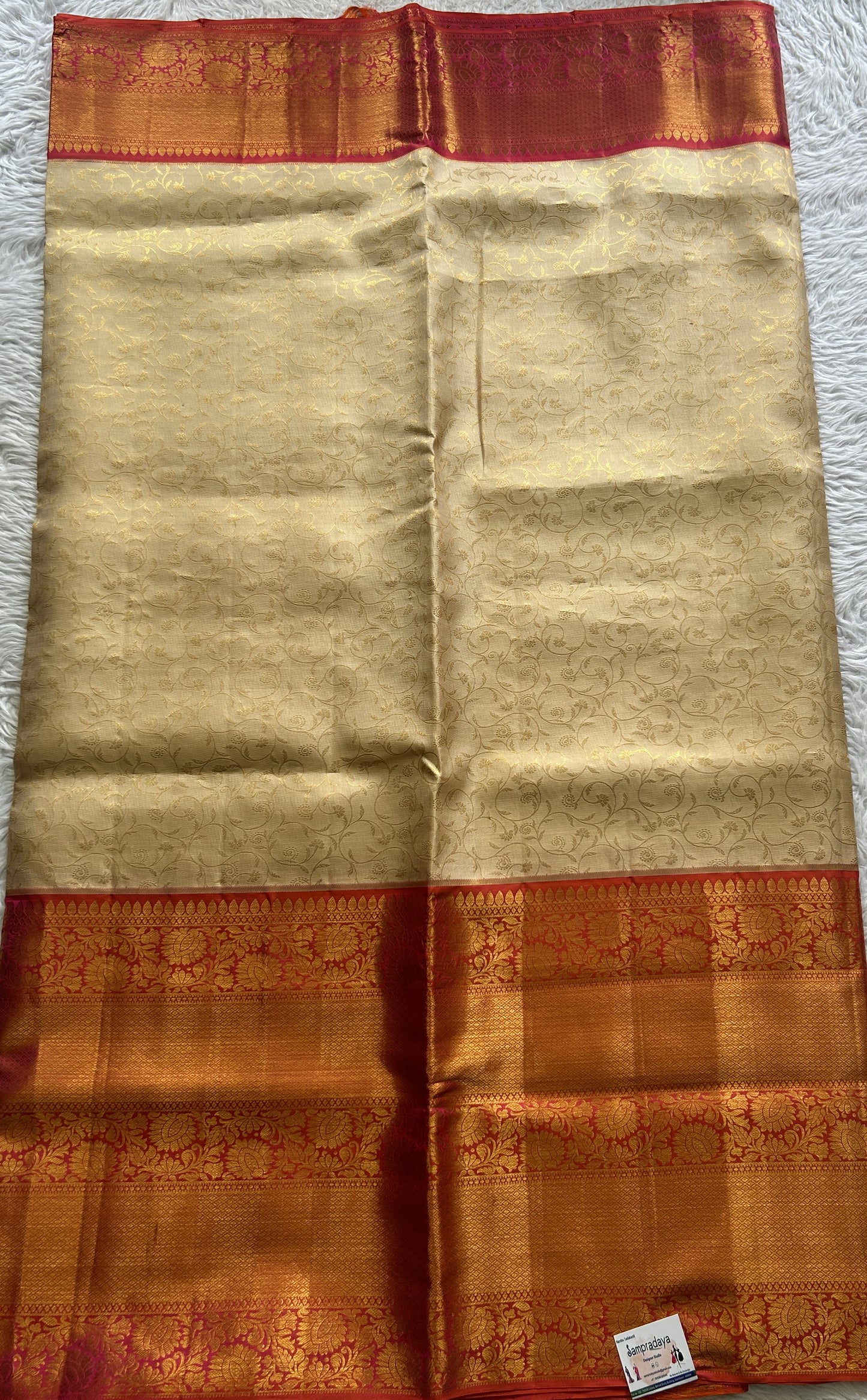 Kanjivaram Bridal Silk Saree Cream colored complemented with a Zari border - Sampradaya Designer Studio