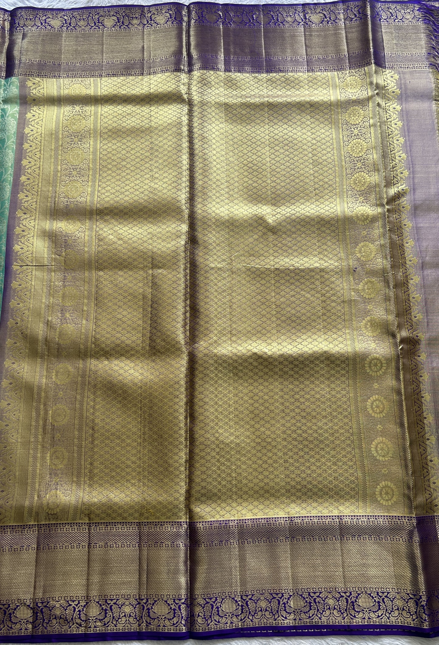 Kanjivaram Bridal Silk Saree Light Green colored complemented with a Violet Color Zari border - Sampradaya Designer Studio