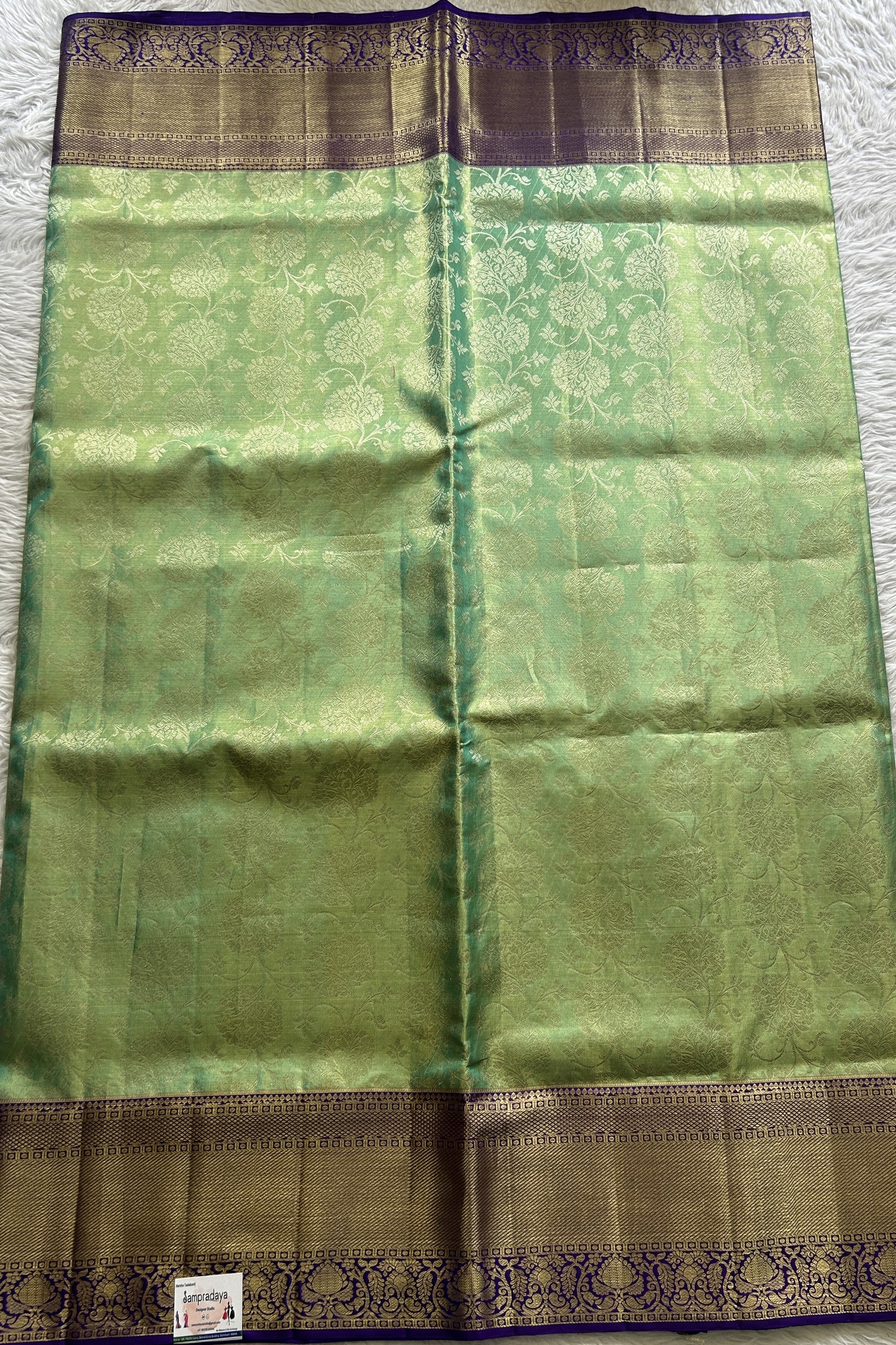 Kanjivaram Bridal Silk Saree Light Green colored complemented with a Violet Color Zari border - Sampradaya Designer Studio