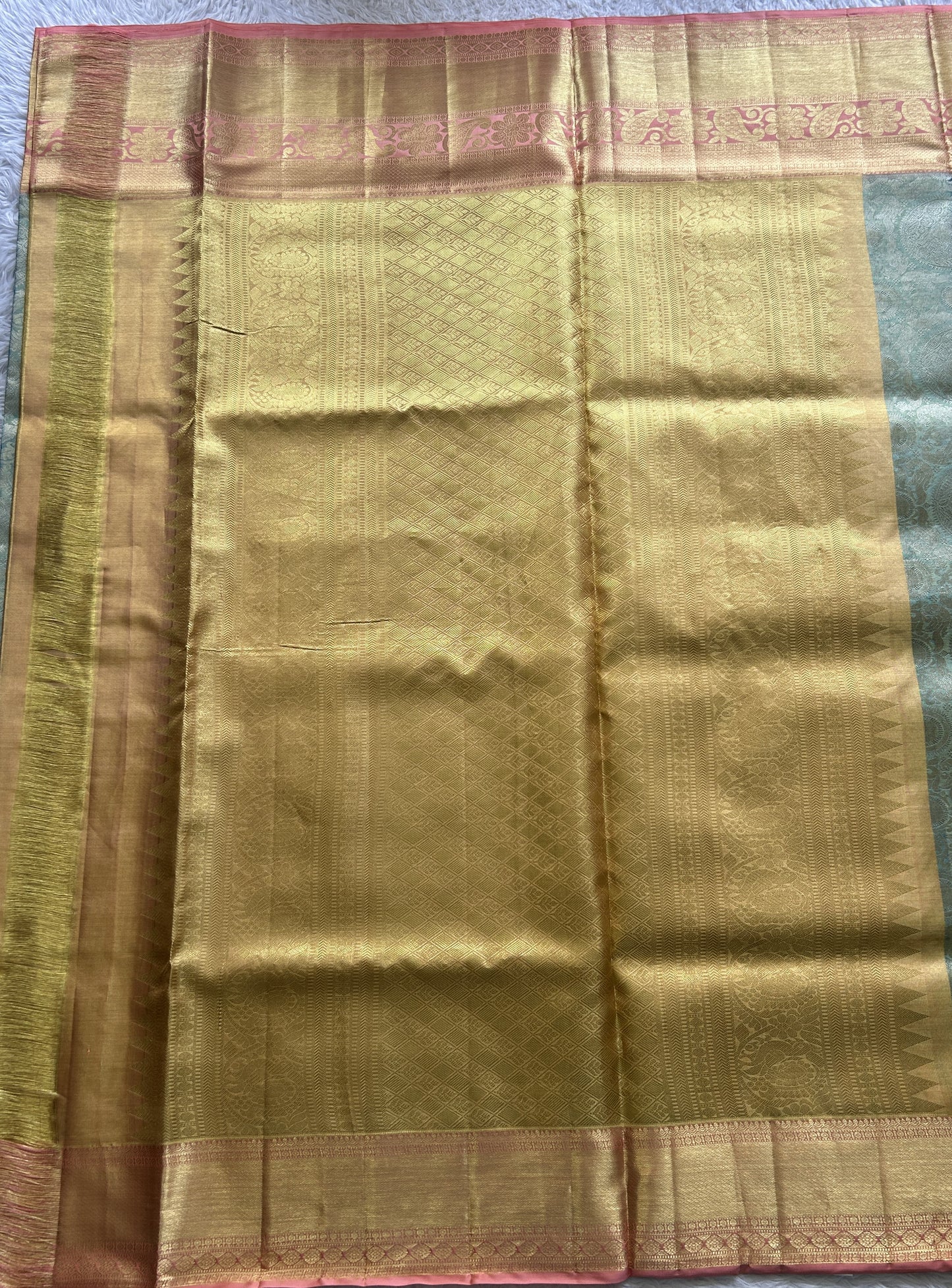 Kanjivaram Bridal Silk Saree Sea Blue colored complemented with a Peach Color Zari border. - Sampradaya Designer Studio
