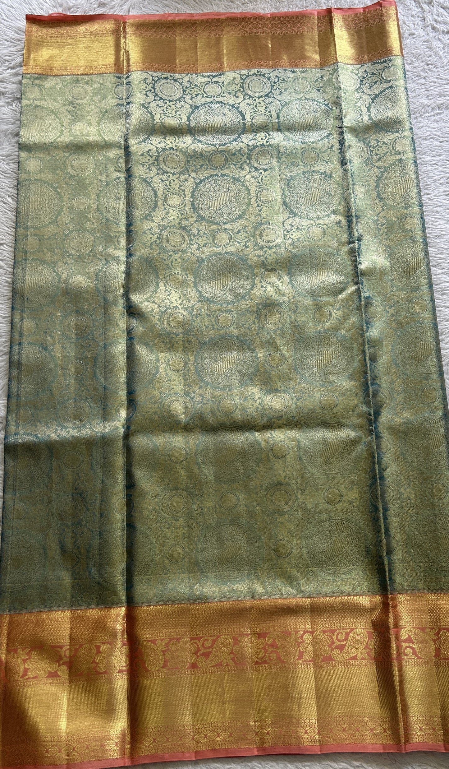 Kanjivaram Bridal Silk Saree Sea Blue colored complemented with a Peach Color Zari border. - Sampradaya Designer Studio