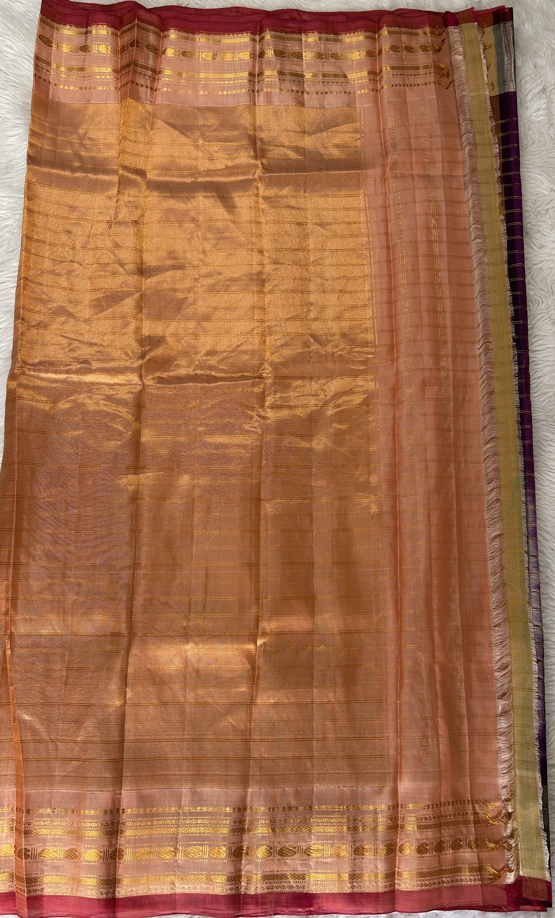 Gadwal Pattu Purple Colored Saree Complemented With a Peach Color Kanchi Gap Border - Sampradaya Designer Studio
