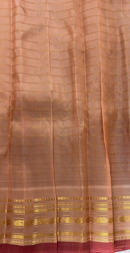 Gadwal Pattu Purple Colored Saree Complemented With a Peach Color Kanchi Gap Border - Sampradaya Designer Studio