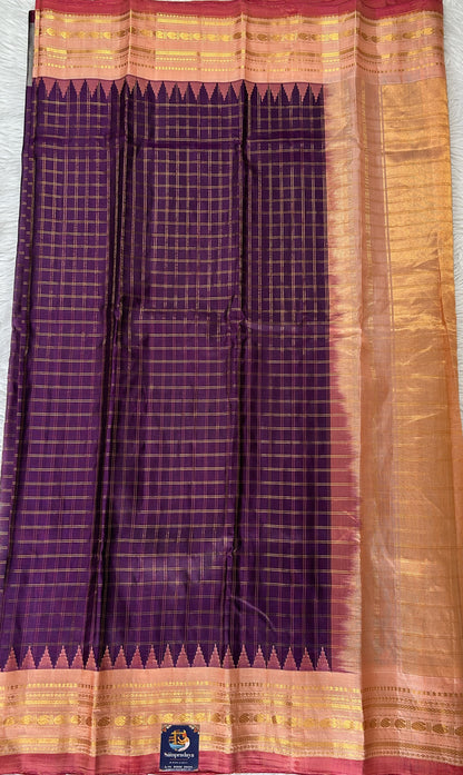 Gadwal Pattu Purple Colored Saree Complemented With a Peach Color Kanchi Gap Border - Sampradaya Designer Studio
