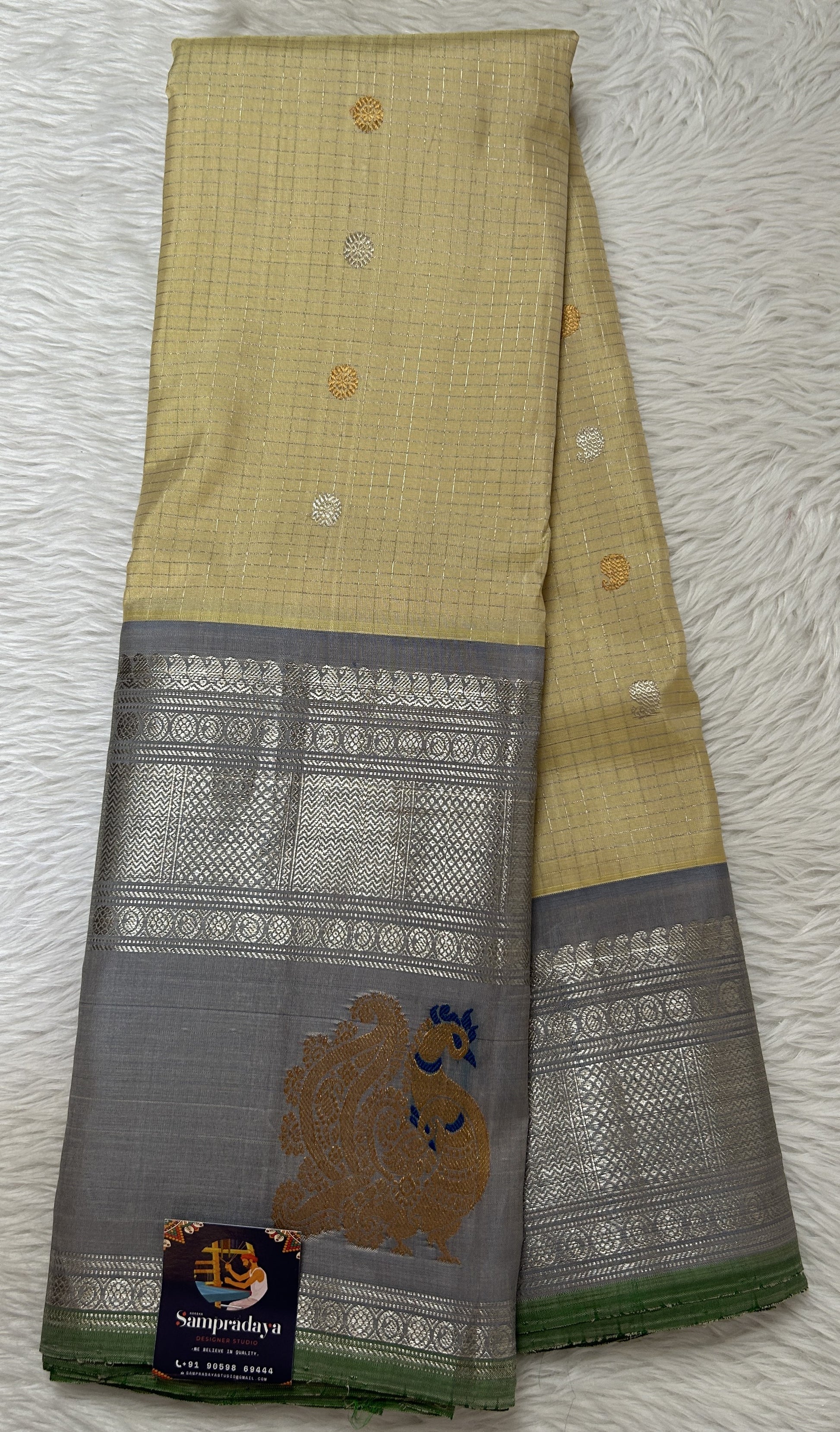 Gadwal Pattu Cream Colored Saree Complemented With a Gray Color Kanchi Border - Sampradaya Designer Studio