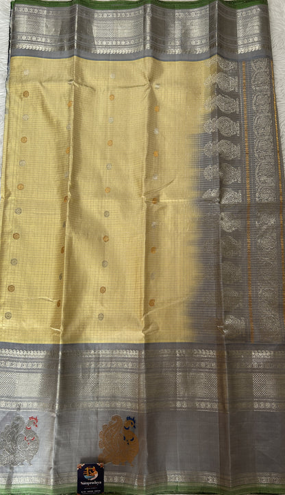 Gadwal Pattu Cream Colored Saree Complemented With a Gray Color Kanchi Border - Sampradaya Designer Studio