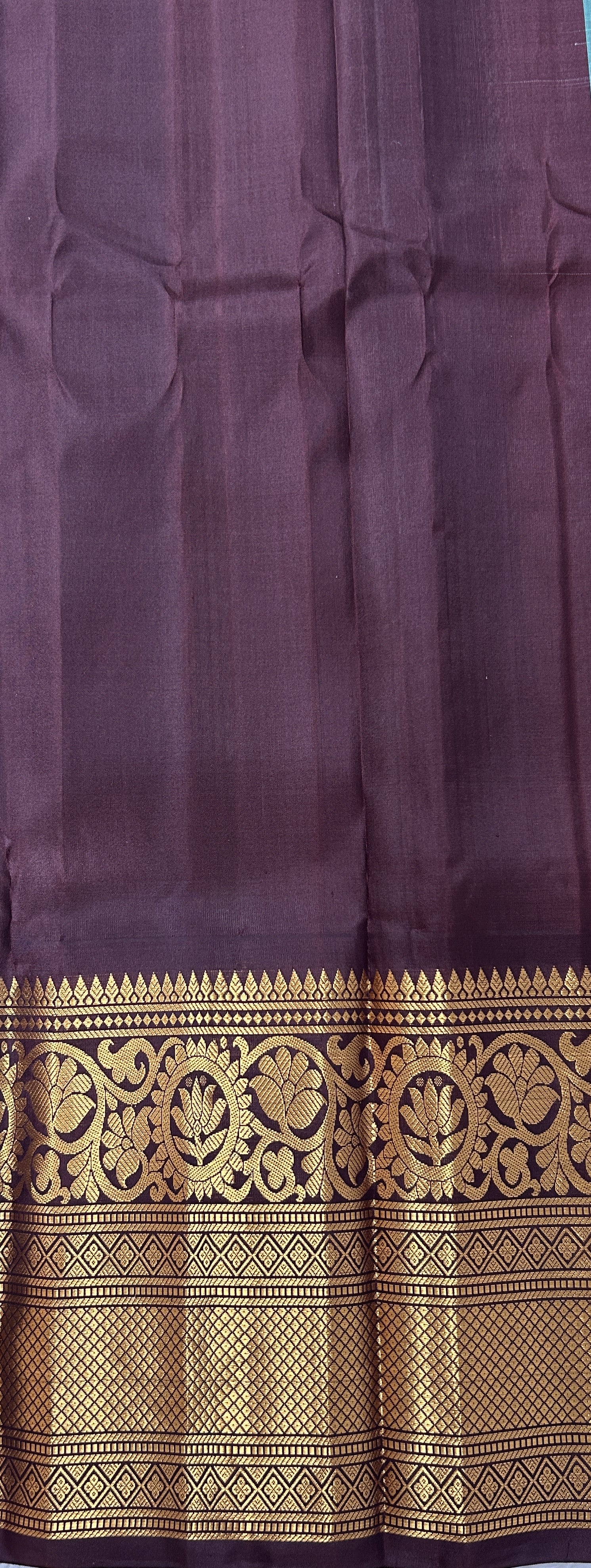 Gadwal Pattu Green Colored Saree Complemented With a Brown Color Kanchi Border - Sampradaya Designer Studio