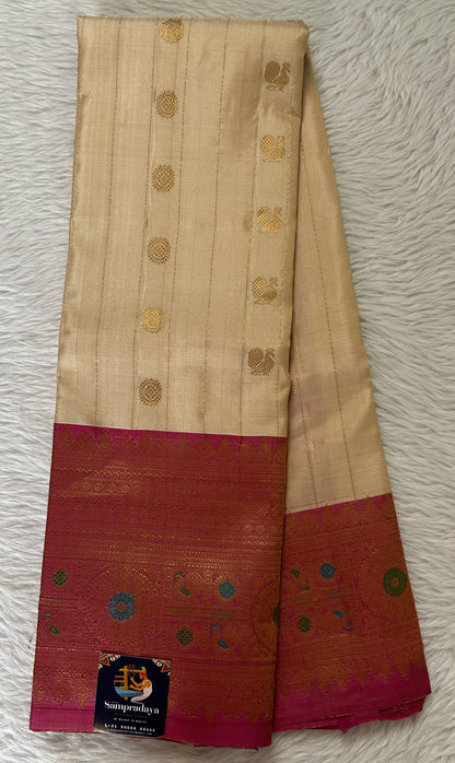 Gadwal Pattu Saree Cream Colored Complemented With a Pink Color Kanchi Border - Sampradaya Designer Studio