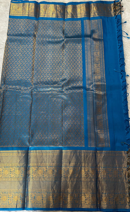 Gadwal Silk Saree Blue Colored Complemented With a Kanchi Border - Sampradaya Designer Studio