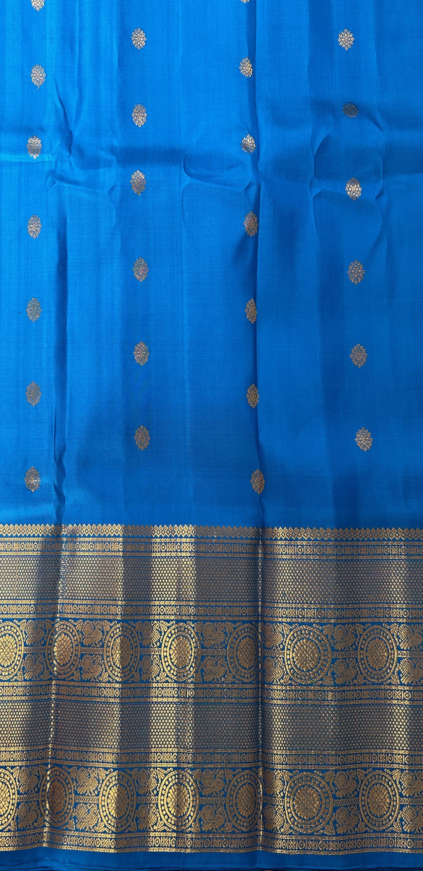 Gadwal Silk Saree Blue Colored Complemented With a Kanchi Border - Sampradaya Designer Studio