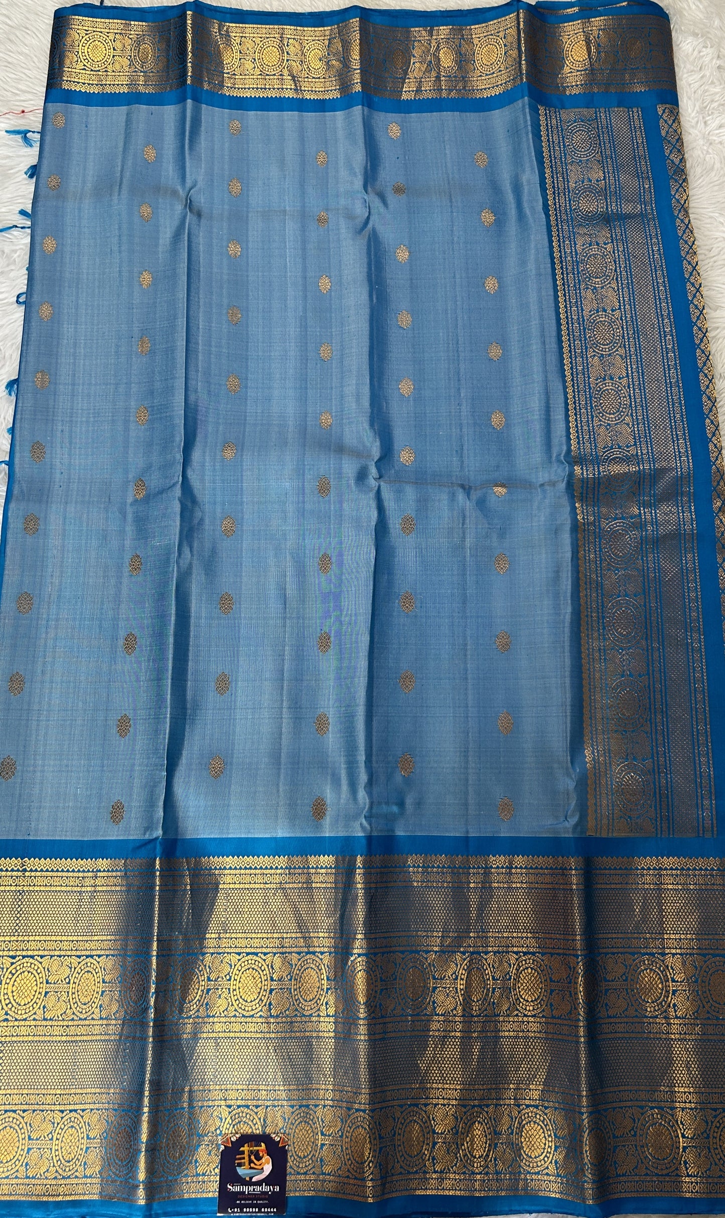 Gadwal Silk Saree Blue Colored Complemented With a Kanchi Border - Sampradaya Designer Studio