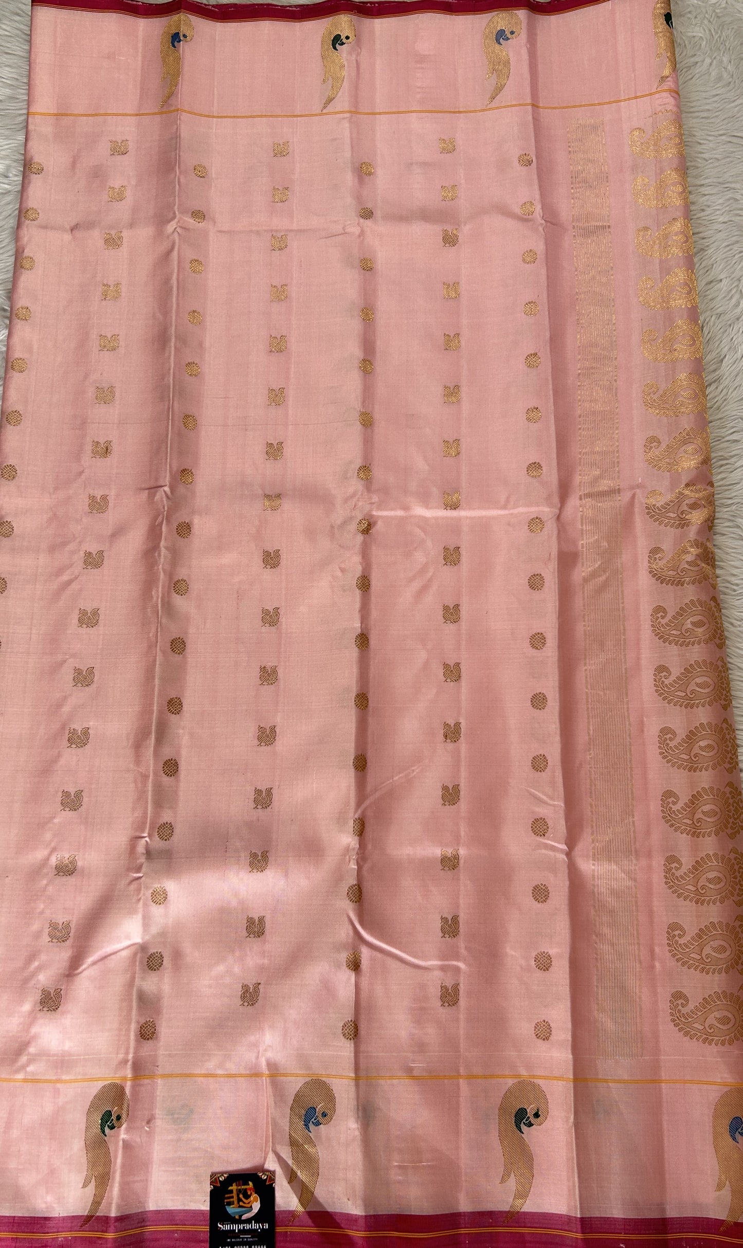 Gadwal Silk Saree Baby Pink Colored Complemented With a Muniya Border - Sampradaya Designer Studio