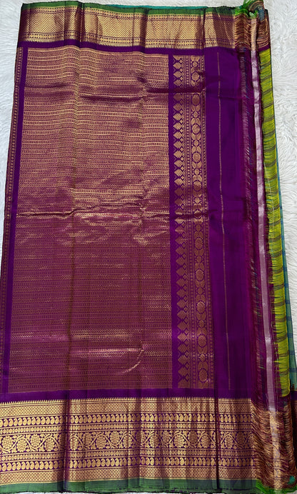 Gadwal Silk Saree Blue Green Colored Complemented With a Violet Color Kanchi Border - Sampradaya Designer Studio