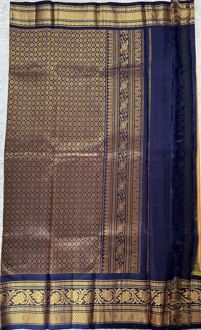 Gadwal Silk Saree Light Orange Colored Complemented With a Navy Blue Color Kanchi Border - Sampradaya Designer Studio