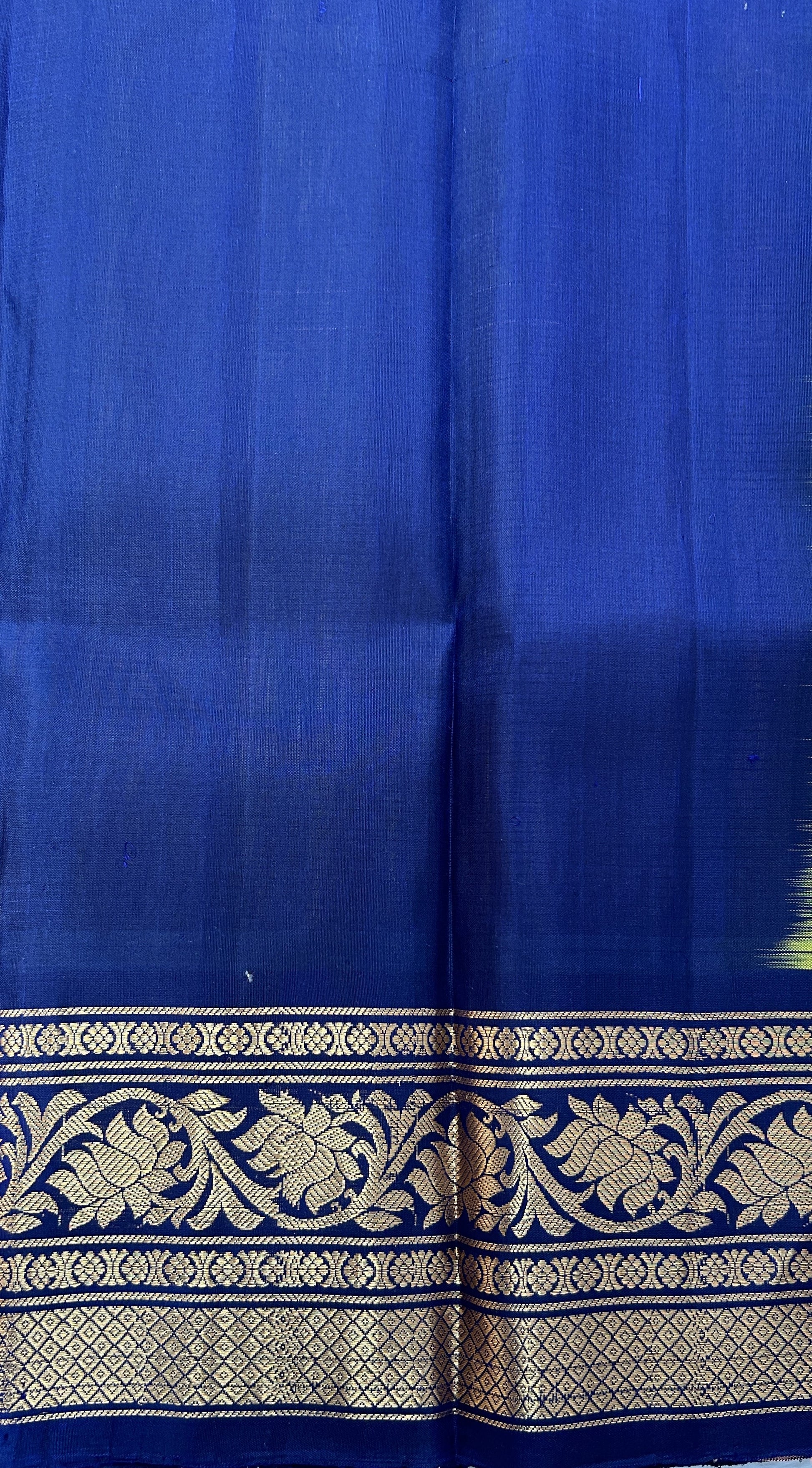 Gadwal Silk Saree Light Orange Colored Complemented With a Navy Blue Color Kanchi Border - Sampradaya Designer Studio