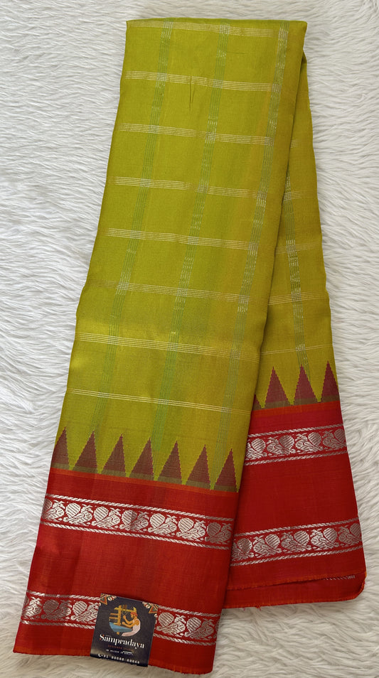 Gadwal Silk Saree Lemon Yellow Colored Complemented With a Peachy Pink Color Kanchi Gap Border - Sampradaya Designer Studio