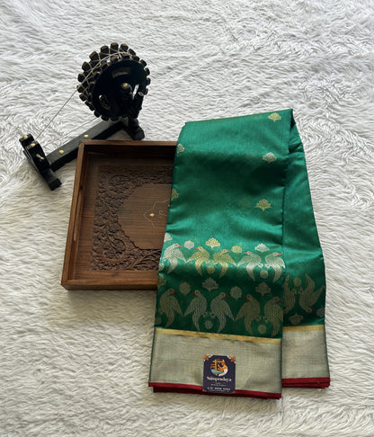 Chanderi Silk Saree Green color complemented with a Zari border - Sampradaya Designer Studio
